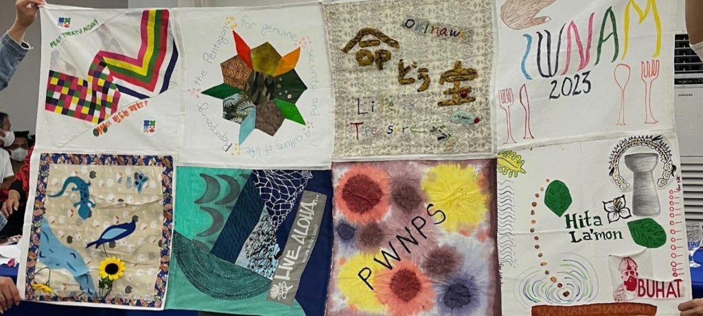 Figure 15. FEMINIST VISIONS OF GENUINE SECURITY Country groups brought pre-made quilt squares, cut to a specified size, to the 10th international meeting in the Philippines, 2023. Top row L to R: Korea, continental USA, Okinawa, Philippines. Bottom row L to R: mainland Japan, Hawai’i, Philippines, and Guåhan/Saipan. The pieces were assembled during the meeting by members of Buklod Women’s Empowerment Inc., a Network member group.