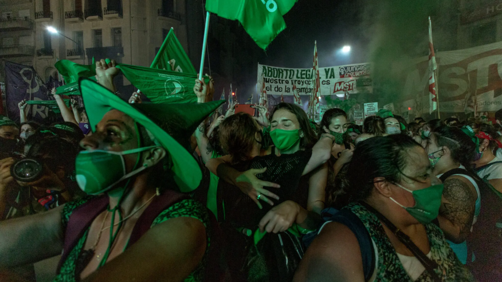 Figure 2. Argentinian feminist protester wearing a green witch hat